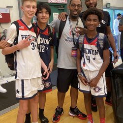 Norman Powell of the Clippers with Coach Mack and Students at Phenom Basketball Camp 2022