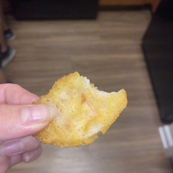 McDonald's - a hand holding a piece of bread - Burgers Near Me - Lake Elsinore, California McDonald's - a hand holding a piece of bread - Burgers Near Me - Lake Elsinore, California