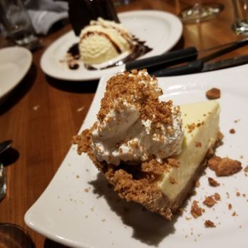 J. Alexander's - Key lime pie and chocolate cake w ice cream... we rolled out the door! But smiling. - New American Near Me - Houston, Texas