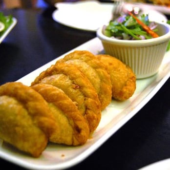 SriPraPhai Thai Restaurant - Fried curry puff with potato and white onion filling and cucumber salad $5.5 - Thai Near Me - Woodside, New York SriPraPhai Thai Restaurant - Fried curry puff with potato and white onion filling and cucumber salad $5.5 - Thai Near Me - Woodside, New York