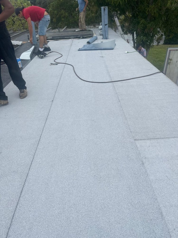 Slide of Escobar Roofing