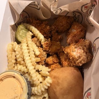 Enzo's Chicken - 10 piece tender bites, spicy. I think it was called "holy cluck", and is spicy but tasty spicy, not just heat. - Wraps Near Me - East Moline, Illinois Enzo's Chicken - 10 piece tender bites, spicy. I think it was called "holy cluck", and is spicy but tasty spicy, not just heat. - Wraps Near Me - East Moline, Illinois