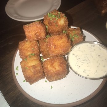 The Waterfront Hotel - Cheesy (Gouda) tater tots - a must-order!!! - New American Near Me - Baltimore, Maryland The Waterfront Hotel - Cheesy (Gouda) tater tots - a must-order!!! - New American Near Me - Baltimore, Maryland