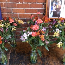 Photo of Martin de Porres House of Hospitality - San Francisco, CA, US. Flowers for the tables.