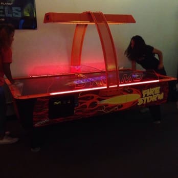 Diversions Game Room - Air hockey table table costs 6 tokens total and stops after one opponent scores 7 goals. - Arcades Near Me - San Antonio, Texas