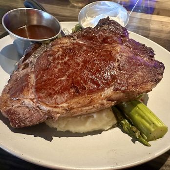 Raiders Tavern & Grill - 12 ounce Prime Rib, Smash Potatoes, & Asparagus. - American Near Me - Henderson, Nevada