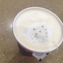 The staff here are so friendly - one of the baristas attempted latte art (check the cat out!)