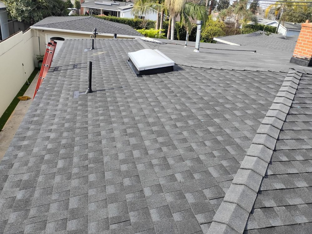 Slide of Sam's Roofing Co