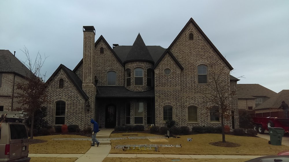 Slide of Reveles Roofing