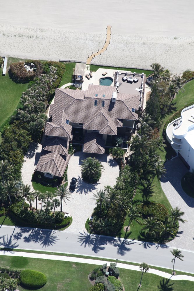 Slide of All American Roofing And Coating Of Florida