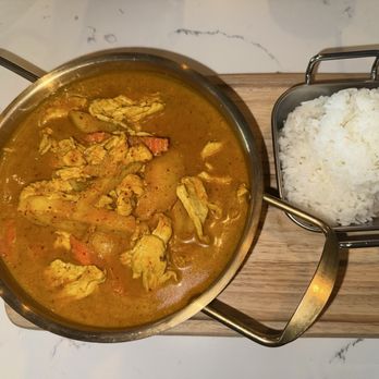 My Home Thai Bistro - Yellow curry with chicken and rice - Thai Near Me - Stafford, Virginia My Home Thai Bistro - Yellow curry with chicken and rice - Thai Near Me - Stafford, Virginia