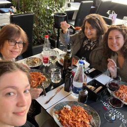 My family and I eating the meal we made with Carmen. Wine was also included! My family and I eating the meal we made with Carmen. Wine was also included!