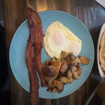 Heritage House Cafe - 2 piece bacon, over easy eggs, and rosemary garlic potatoes! - Cafes Near Me - Vacaville, California Heritage House Cafe - 2 piece bacon, over easy eggs, and rosemary garlic potatoes! - Cafes Near Me - Vacaville, California