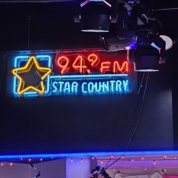 Sidewinders Steakhouse & Saloon - Neon sign advertising 94.9FM Star Country radio station. - Bars Near Me - Roanoke, Virginia