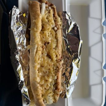 Footies Hot Dogs - One hell of a killer foot long chili cheese dog - Hot Dogs Near Me - Wyoming, Michigan Footies Hot Dogs - One hell of a killer foot long chili cheese dog - Hot Dogs Near Me - Wyoming, Michigan