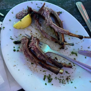 Hellas Restaurant - The devoured lamb chops. Very yummy especially if you're a fan of eating lamb and I am. - Bakeries Near Me - Tarpon Springs, Florida