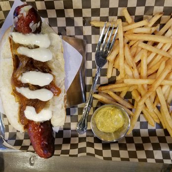 Bangers & Brews Eugene - Hot smoke andouille, with garlic aioli, caramelized onions, and warmed sauerkraut. Skinny fries and spicy mustard on the side. - German Near Me - Eugene, Oregon