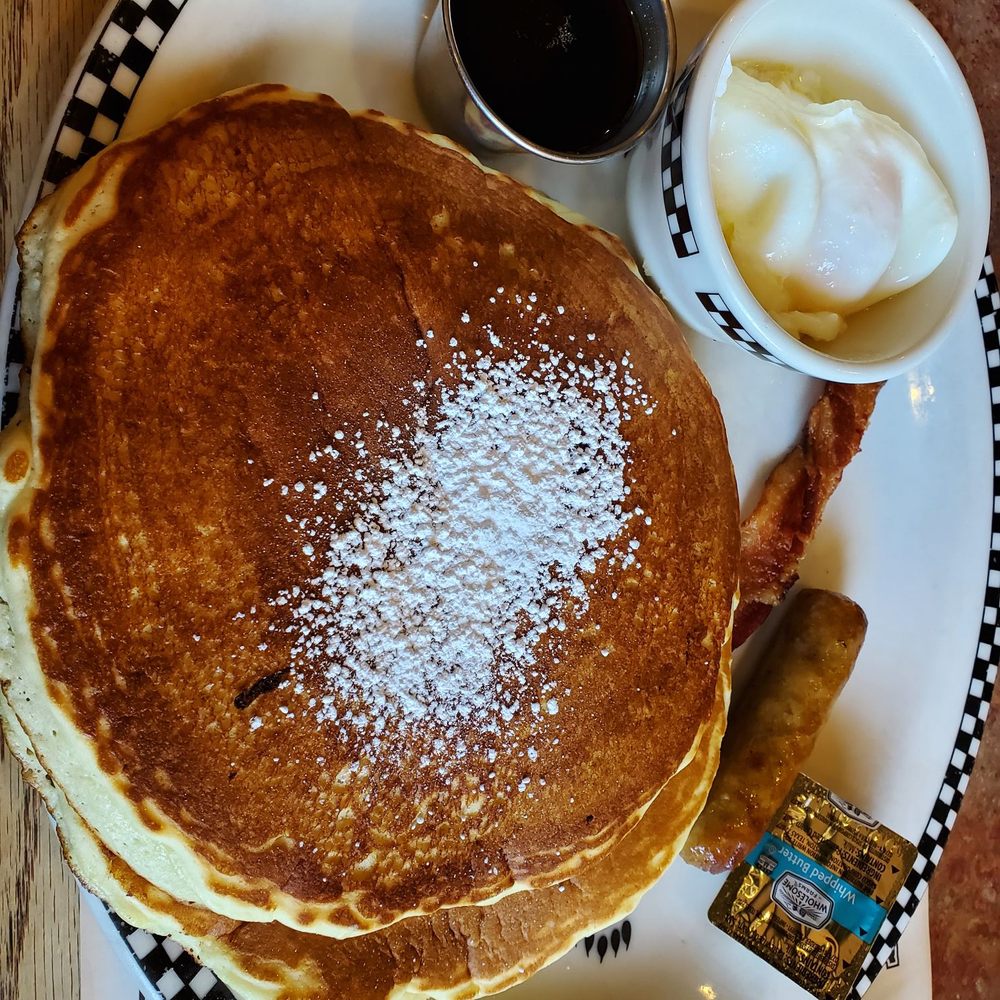 Bear's choice pancakes, poached eggs bacon and sausage yummy Bear's choice pancakes, poached eggs bacon and sausage yummy