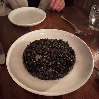 Estela - Fried arroz negro with squid and romesco - New American Near Me - New York, New York Estela - Fried arroz negro with squid and romesco - New American Near Me - New York, New York