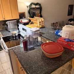 Atlas CleanWorks - Visible pot and bowls on stove and counter not touched.