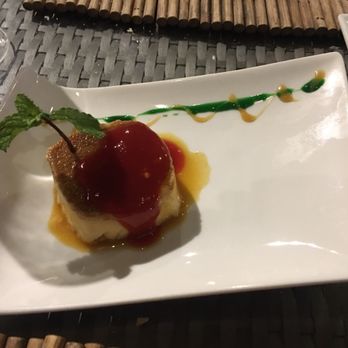 The Level - Flan with strawberry topping perfect to share - Resorts Near Me - Punta Cana, UM The Level - Flan with strawberry topping perfect to share - Resorts Near Me - Punta Cana, UM