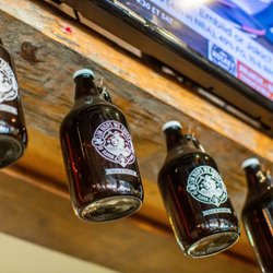 Hoptinger Bier Garden & Sausage House - Find a beer you like? Bring home a growler.
