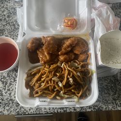 Stir Fry Express - 17. Chicken Lo Mein + 49. Sesame Chicken dinner combo (not pictured egg roll or drink) white rice on side with sweet 'n sour sauce. $11.71