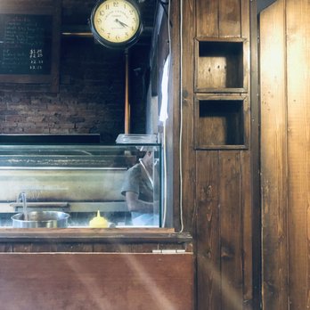 Hot Pie Pizza - a clock in the background - Pizza Near Me - Vancouver, British Columbia Hot Pie Pizza - a clock in the background - Pizza Near Me - Vancouver, British Columbia