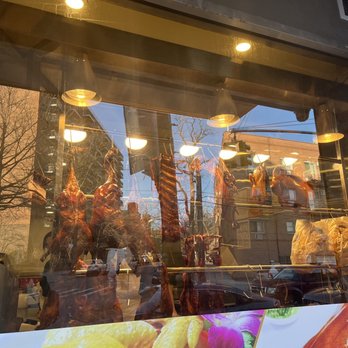 Wang Wang Queens - the reflection of a restaurant window - Cantonese Near Me - Flushing, New York