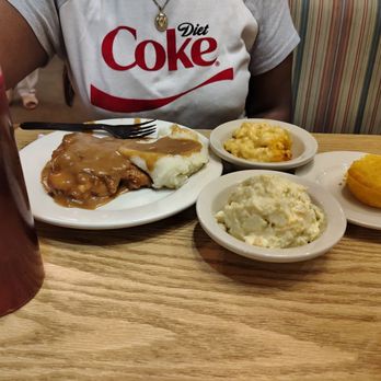 Piccadilly - Smothered Pork Chop and Gravy Mac n Cheese Cornbread Muffin Potato Salad - Southern Near Me - Newport News, Virginia Piccadilly - Smothered Pork Chop and Gravy Mac n Cheese Cornbread Muffin Potato Salad - Southern Near Me - Newport News, Virginia