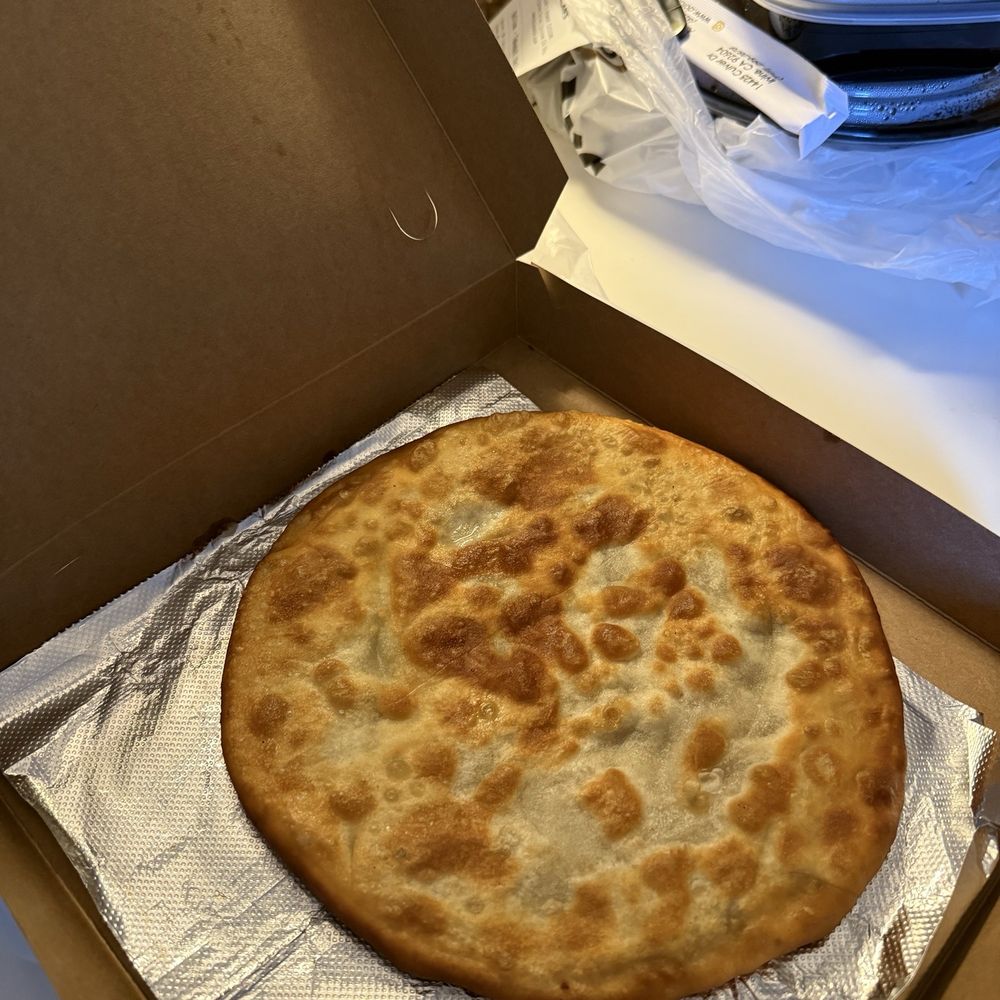 Dolan’s Uyghur Cuisine - So good! Uyghur Goshnaan. It's like a pie with ground meat. Come in a pizza box - Chinese Near Me - Irvine, California