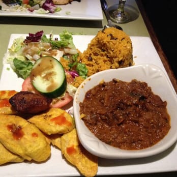 Merengue Restaurant - Vegan dish with plantains, salad, eggplant, and Spanish rice - Latin American Near Me - Boston, Massachusetts Merengue Restaurant - Vegan dish with plantains, salad, eggplant, and Spanish rice - Latin American Near Me - Boston, Massachusetts