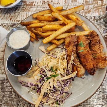Local Table- Fulshear - Fish and chips. Cole slaw with seasoned fries and cod bites. - Breakfast & Brunch Near Me - Fulshear, Texas Local Table- Fulshear - Fish and chips. Cole slaw with seasoned fries and cod bites. - Breakfast & Brunch Near Me - Fulshear, Texas