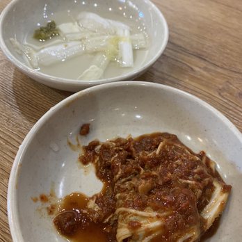 MDK Noodles - Kimchi complimentary sides (white kimchi half eaten) - Noodles Near Me - Houston, Texas