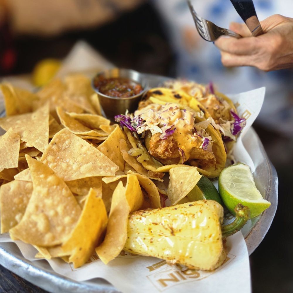 Basin 141 - Fish tacos was a good portion as well. Fish looked delicious.  Use that lime! - Gastropubs Near Me - Monrovia, California