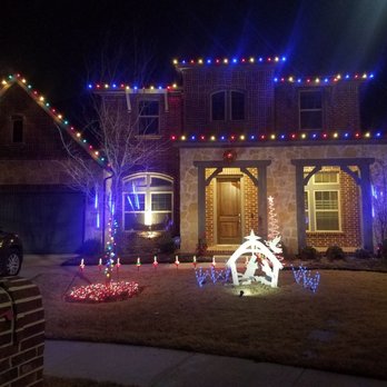 Davis Landscape Services - a house decorated with christmas lights - Landscaping Near Me Davis Landscape Services - a house decorated with christmas lights - Landscaping Near Me