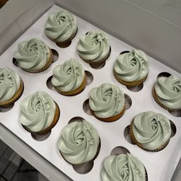Vanilla cupcakes filled with raspberry jam and topped with vanilla buttercream Vanilla cupcakes filled with raspberry jam and topped with vanilla buttercream