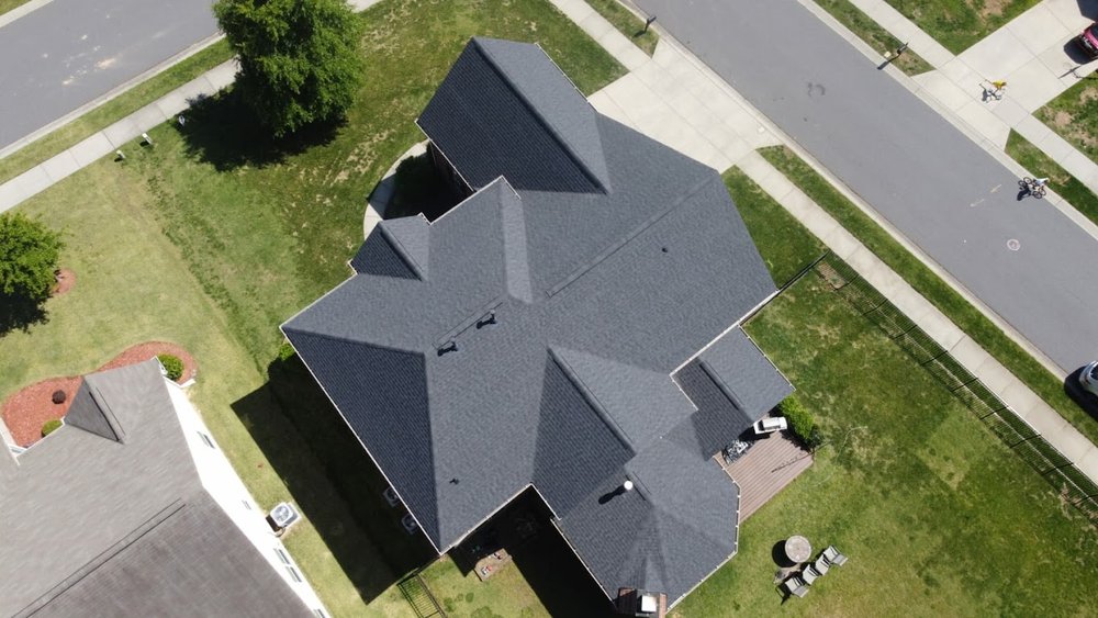 Slide of Freeman Roofing