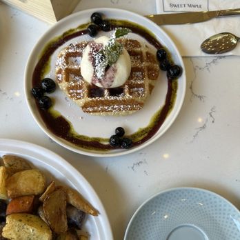 Sweet Maple - Earl Grey Blueberry Croffle $16.00 Croissant waffle, burrata, blueberry marinated in earl grey & basil EVOO, housemade blueberry marmalade - New American Near Me - Walnut Creek, California Sweet Maple - Earl Grey Blueberry Croffle $16.00 Croissant waffle, burrata, blueberry marinated in earl grey & basil EVOO, housemade blueberry marmalade - New American Near Me - Walnut Creek, California