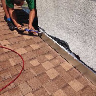 Slide of A Manos Roofing