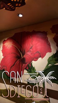 Photo of Miguel's Cocina - San Diego, CA, US. a mural of a red flower