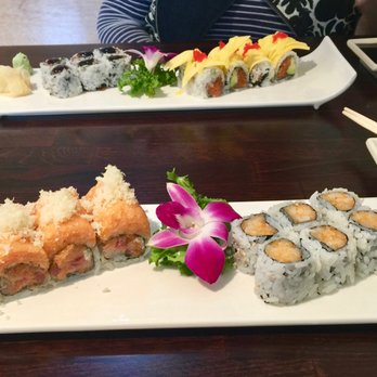 Wasabi Sushi - Wasabi Combo Lunches: On top right to left, Eel and Avocado Roll and Amazing Roll. At the Bottom, Madness Roll and Spicy White Tune Roll. - Japanese Near Me - West Orange, New Jersey Wasabi Sushi - Wasabi Combo Lunches: On top right to left, Eel and Avocado Roll and Amazing Roll. At the Bottom, Madness Roll and Spicy White Tune Roll. - Japanese Near Me - West Orange, New Jersey
