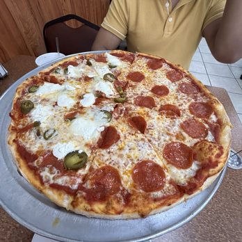 Brooklyn Pizzeria - Medium pizza (half pepperoni, half pepperoni with ricotta and jalapeños) - Pizza Near Me - Humble, Texas Brooklyn Pizzeria - Medium pizza (half pepperoni, half pepperoni with ricotta and jalapeños) - Pizza Near Me - Humble, Texas
