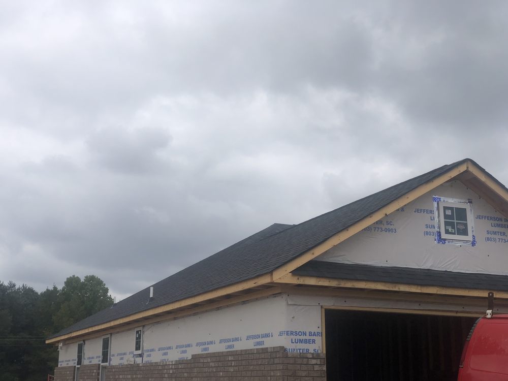 Slide of Brunswick Roofing Company