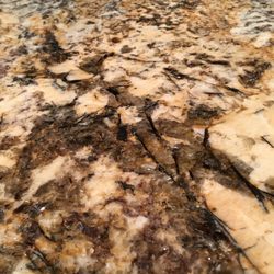 Marvic Corporation Custom Countertops - Lots of mica and golden tones.