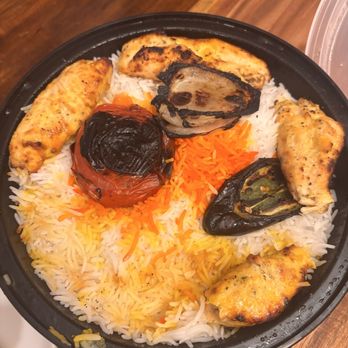 Chelo Kitchen - We already ate some of the chicken in the picture but overall this is the bowl you get! - Mediterranean Near Me - Bristow, Virginia Chelo Kitchen - We already ate some of the chicken in the picture but overall this is the bowl you get! - Mediterranean Near Me - Bristow, Virginia