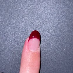 Eagle Nail By TL - pieces of dust and bubbles in nails.