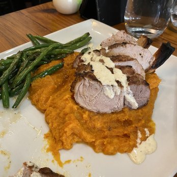 The West Table - Pan Fried Pork Chop - New American Near Me - Lubbock, Texas