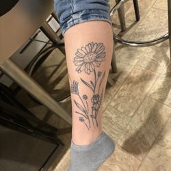 Tattoo America - This is my healed tattoo from the owner, half of it is faded or not there at all and looks like a child drew this design.