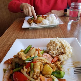 Pinto Thai Bistro - Lunch menu: Cashew Nut w/ Chicken(bottom). Spicy Basil Leaves w/ Tofu and Fried Egg (top). - Thai Near Me - Seattle, Washington
